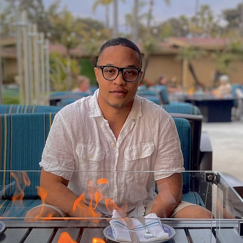 Antonio Winslow, smiling outdoors